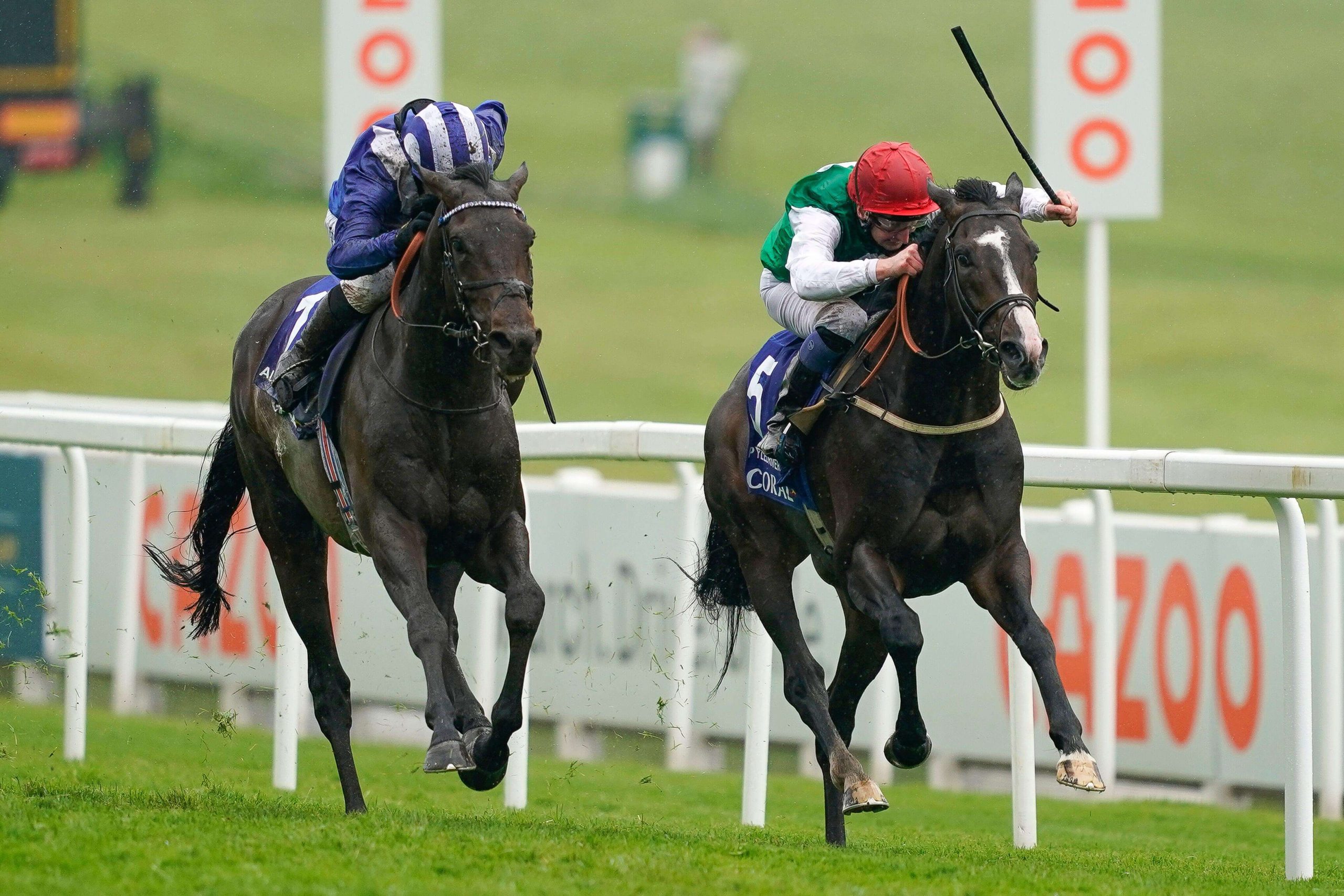 Pyledriver ridden by jockey Martin Dwyer (right) wins The Coral Coronation Cup from Al Aasy ridden by jockey Jim Crowley during day one of the Cazoo Derby Festival at Epsom Racecourse. Picture date: Friday June 4, 2021.