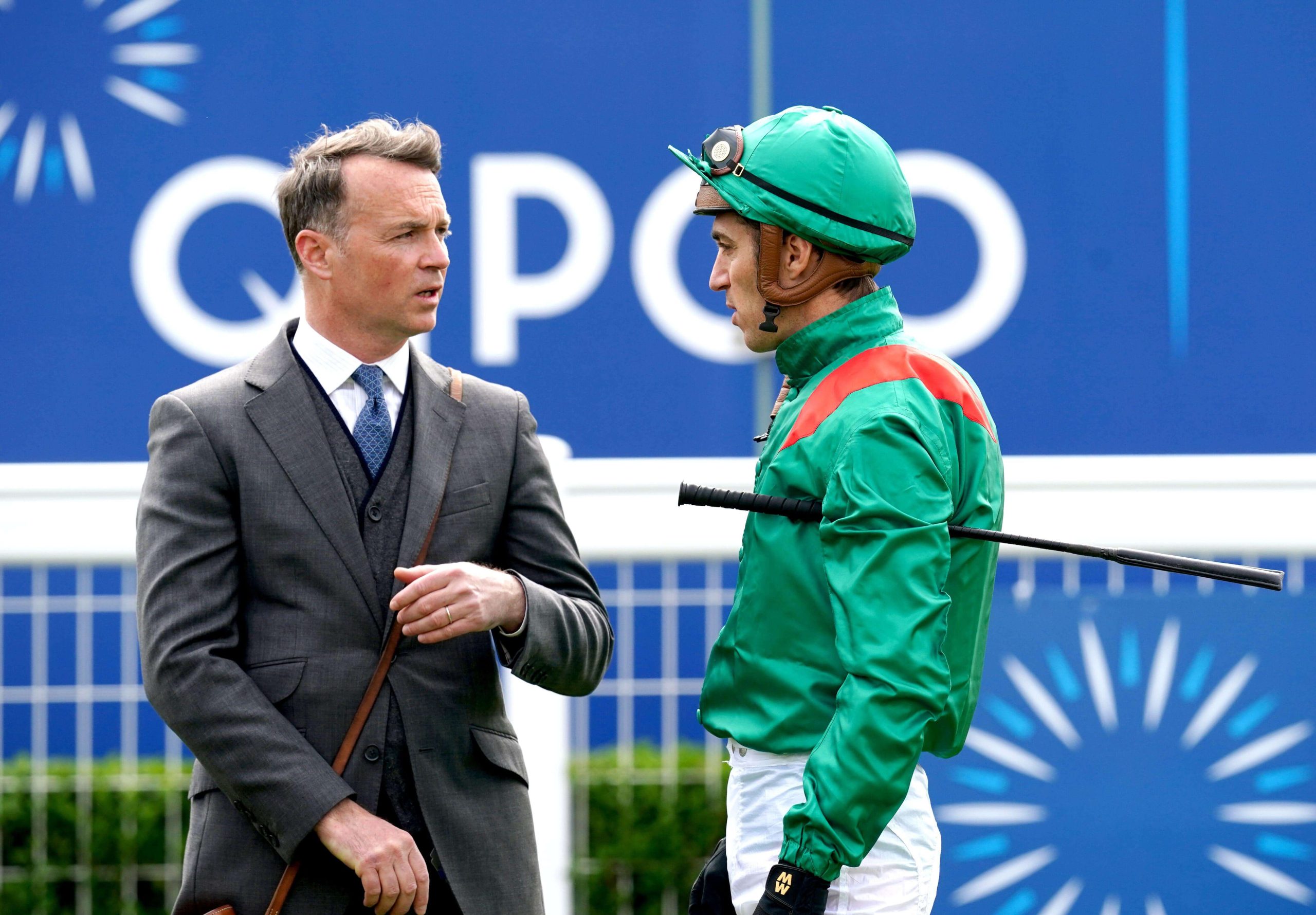Jockey Christophe Soumillon (right) speaks to trainer Francis-Henri Graffard prior to competing in the Betfair Exchange Dahlia Stakes on day three of the QIPCO Guineas Festival at Newmarket Racecourse, Newmarket. Picture date: Sunday May 1, 2022.