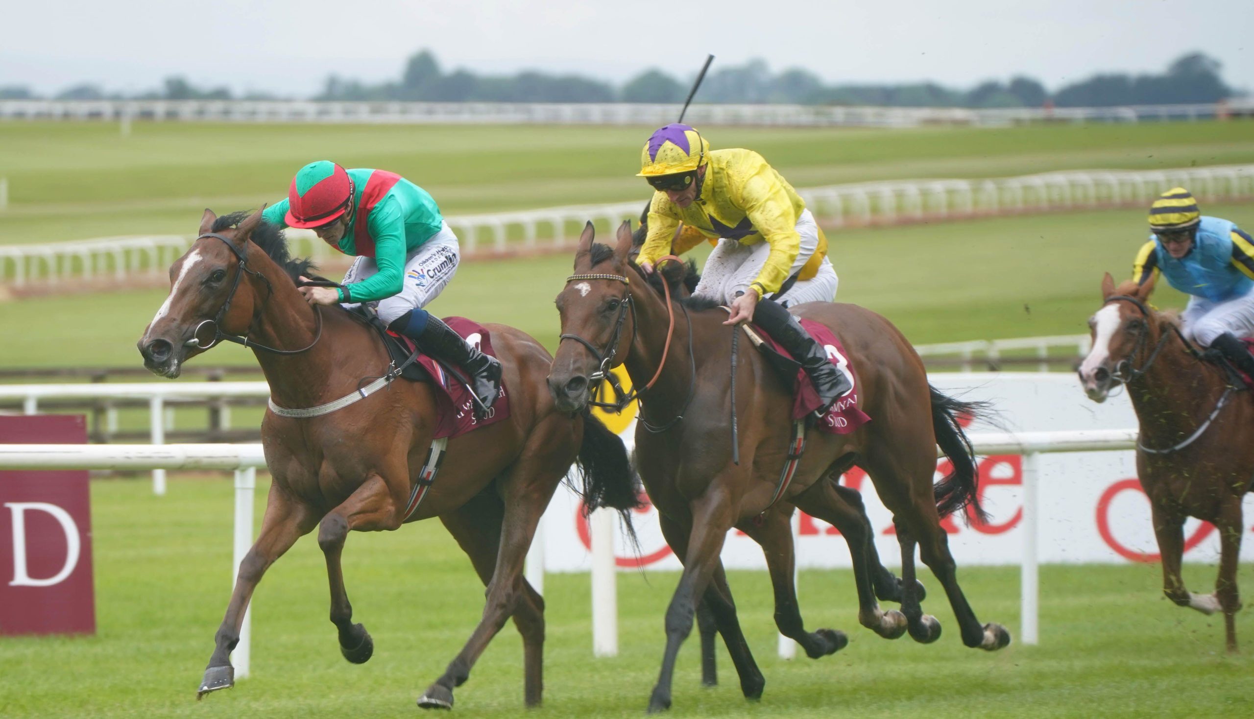 La Petite Coco (left) ridden by jockey William Lee on their way to winning the Alwasmiyah Pretty Polly Stakes during day three of the Dubai Duty Free Irish Derby Festival at Curragh Racecourse in County Kildare, Ireland. Picture date: Sunday June 26, 2022.