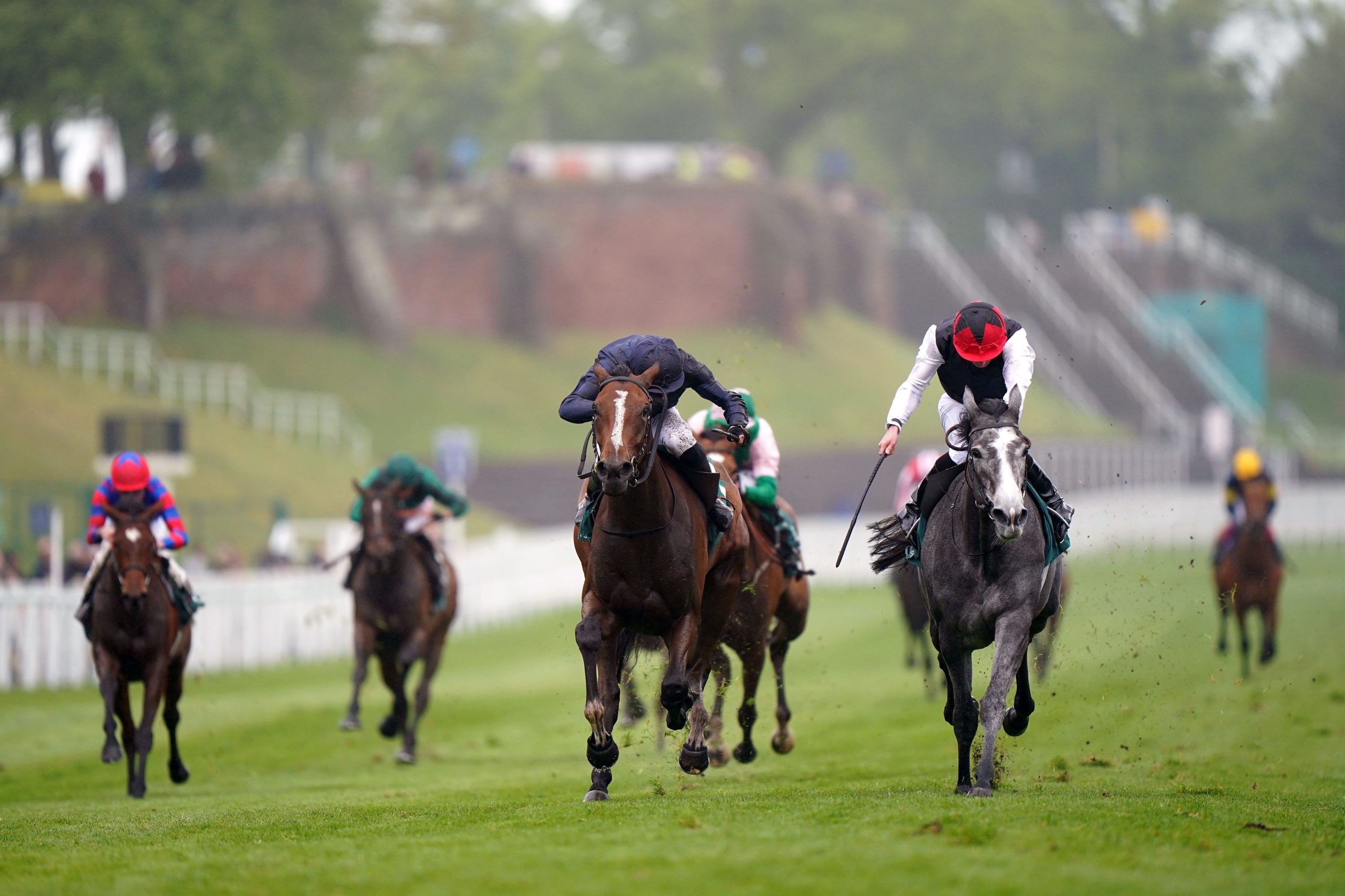 Thoughts Of June (grey horse, right) clung on from Above The Curve (dark blue colours) in the Cheshire Oaks, but those placings may be reversed at the Curragh.
